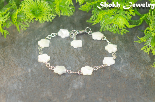 Natural Seashell Flower Link Bracelet with lobster claw clasp and a dangle.