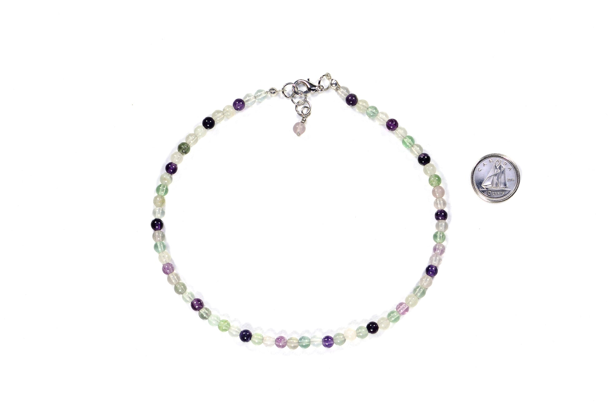 Rainbow Fluorite Crystal Choker Necklace beside a dime.