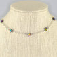 Rainbow Hematite Star and Chain Choker Necklace displayed on a bust.