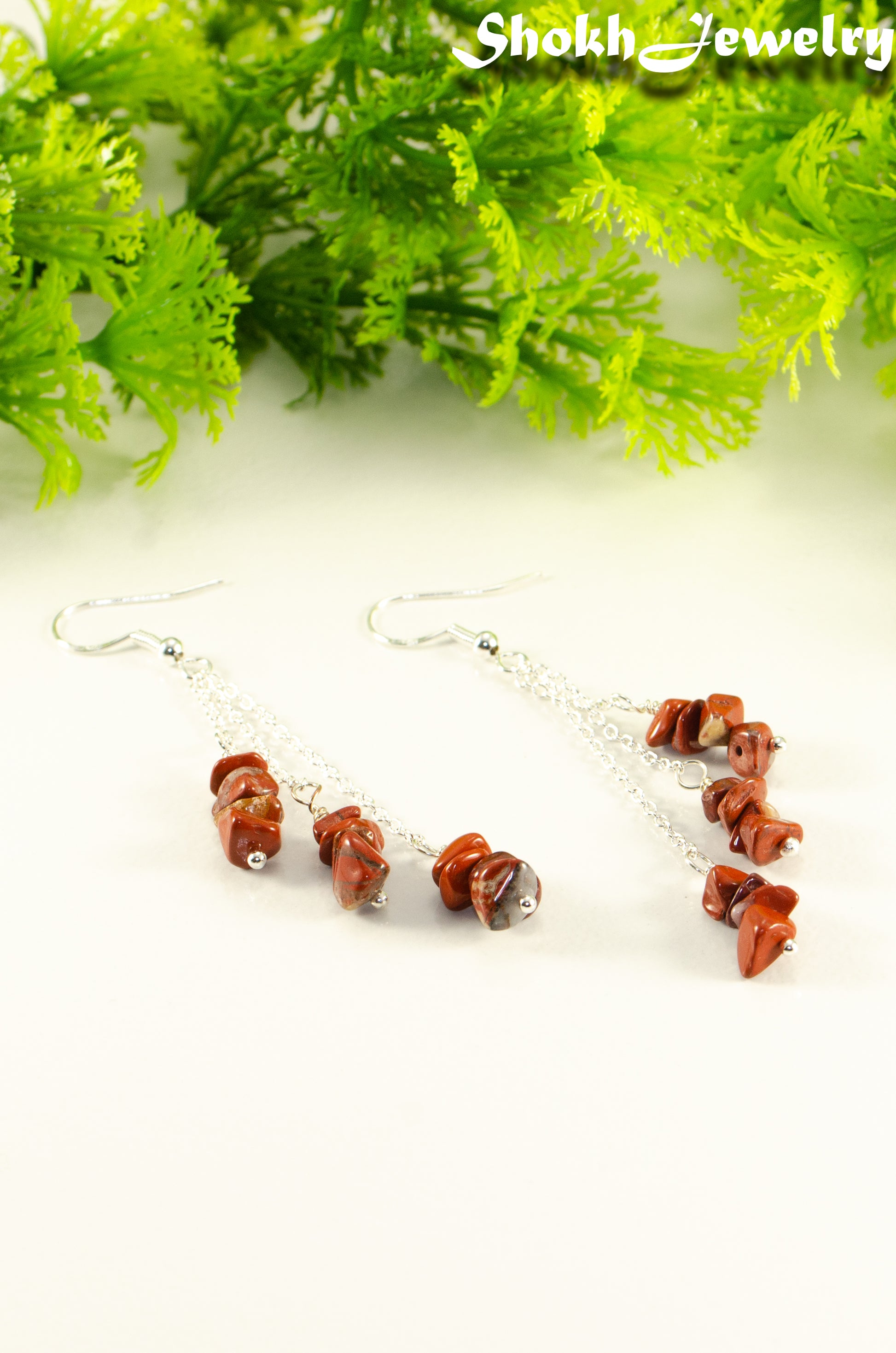 Close up of Long Silver Plated Chain and Red Jasper Chip Earrings.