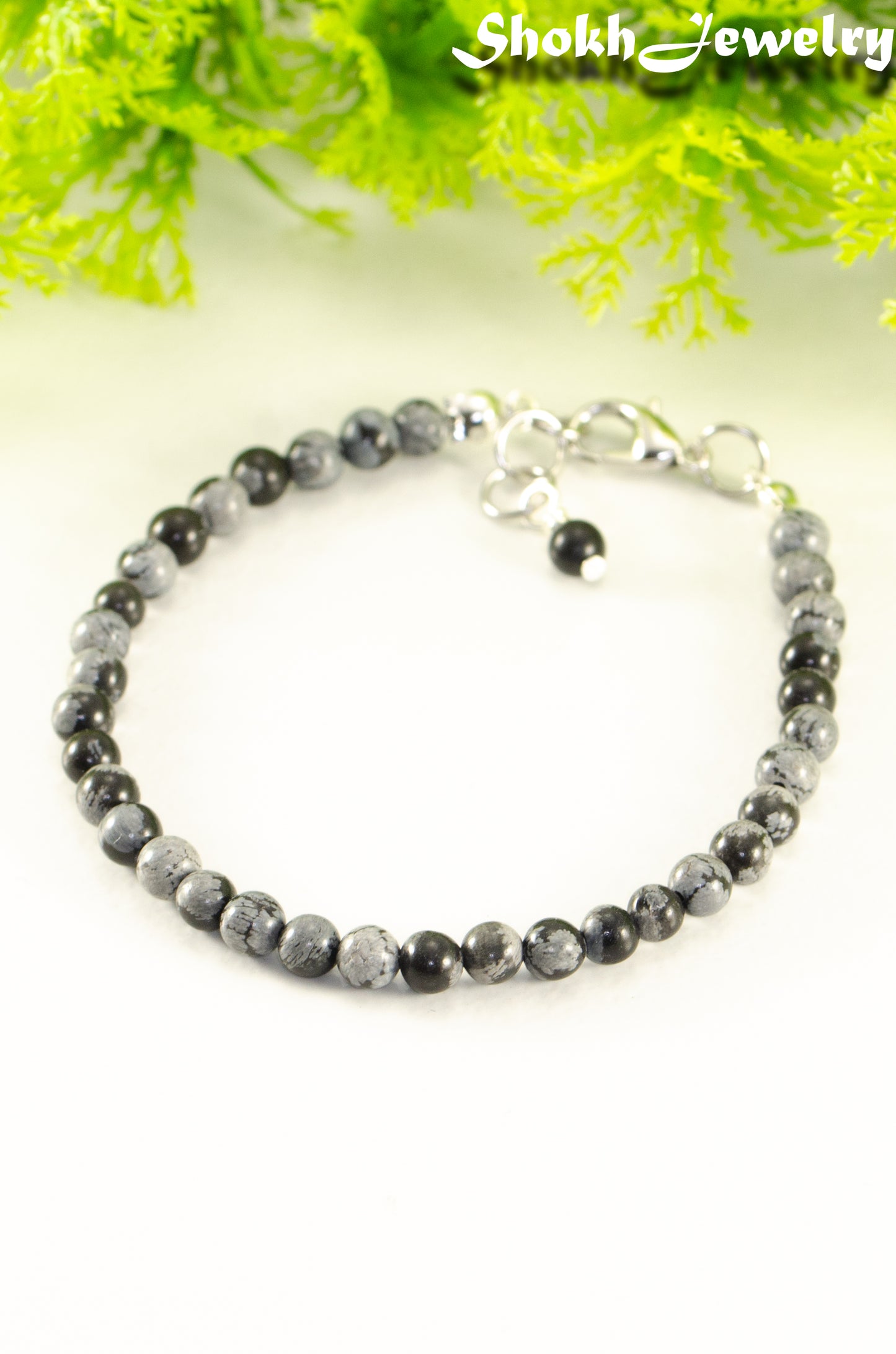 Close up of 4mm Snowflake Obsidian Stone Bracelet with Clasp.