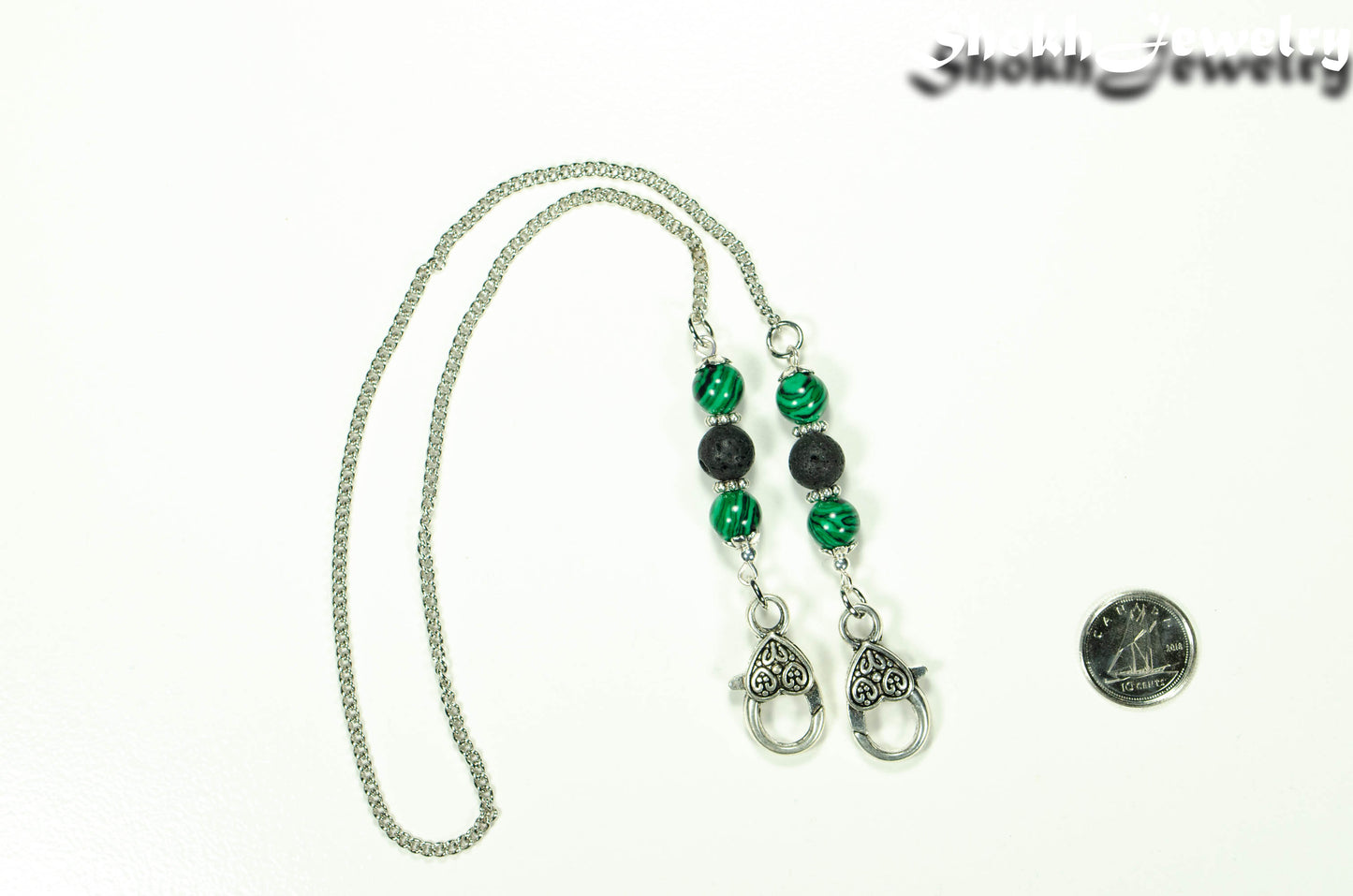 8mm Malachite and Black Lava Stone Eyeglass Chain beside a dime.