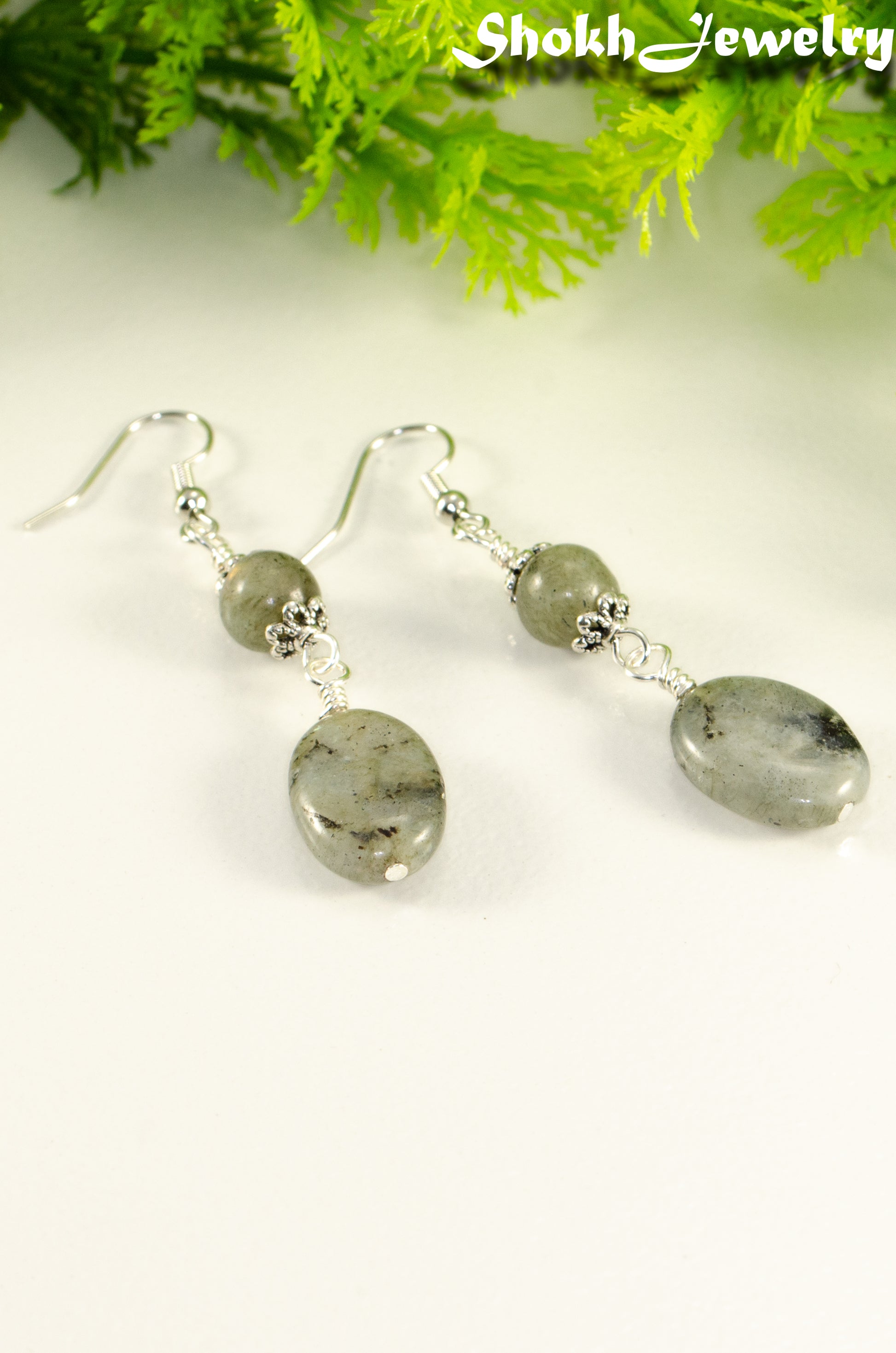 Close up of Statement Labradorite Crystal Earrings.