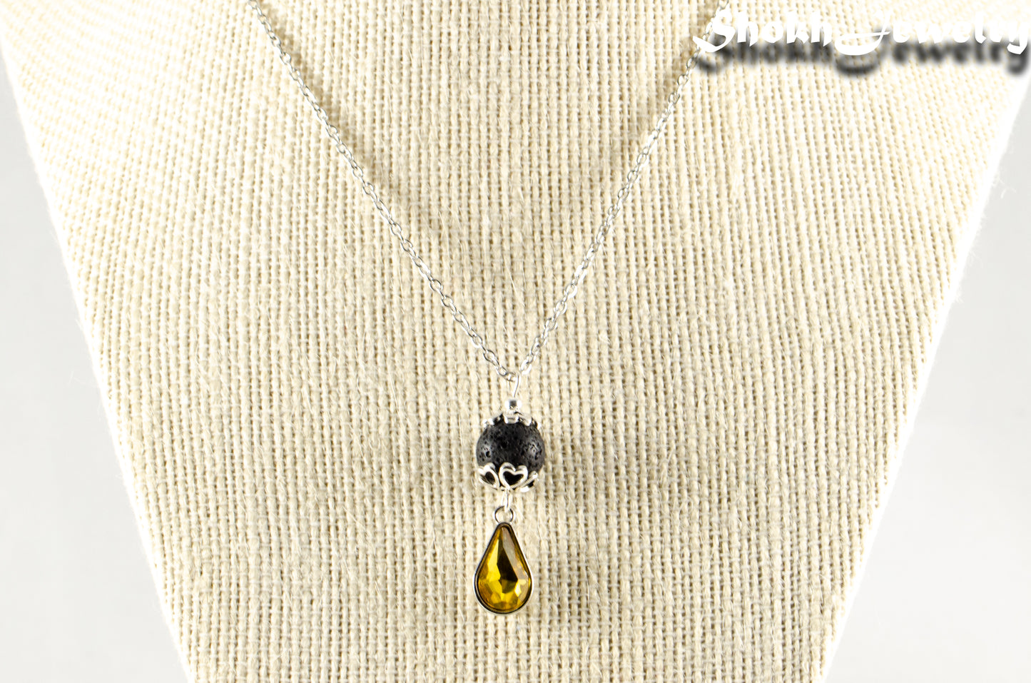 Lava Rock and Teardrop November Birthstone Choker Necklace displayed on a bust.