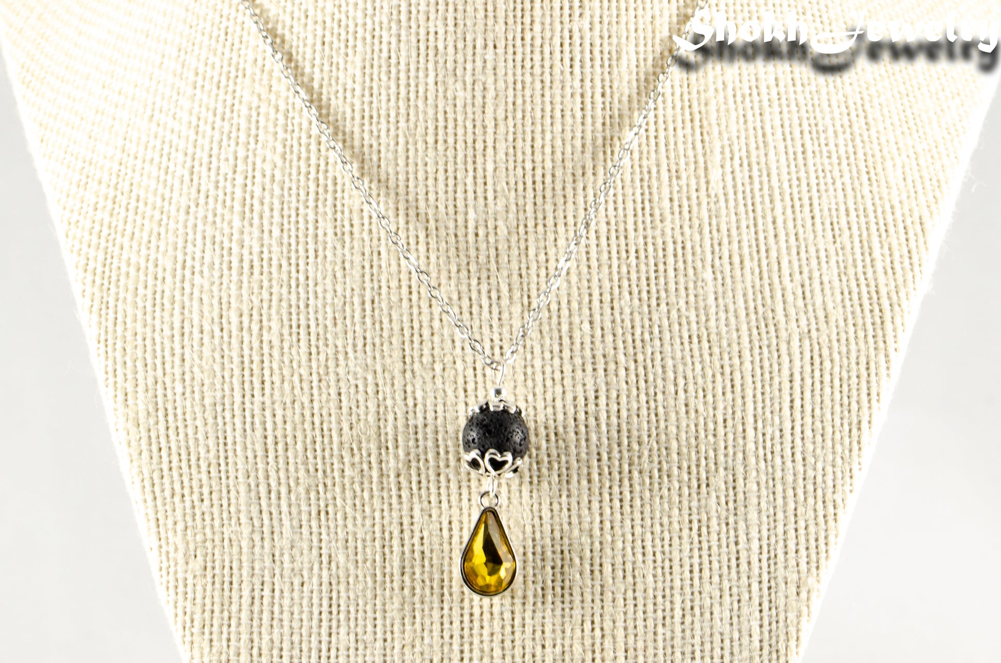 Lava Rock and Teardrop November Birthstone Choker Necklace displayed on a bust.