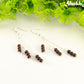 Silver Plated Chain and Garnet Crystal Earrings.