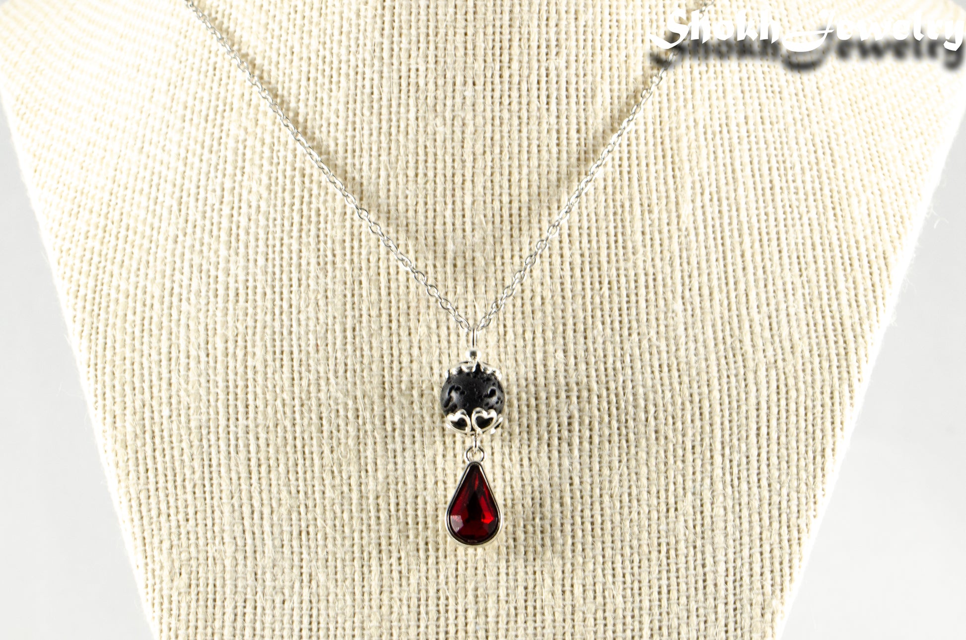 Lava Rock and Teardrop January Birthstone Choker Necklace displayed on a bust.
