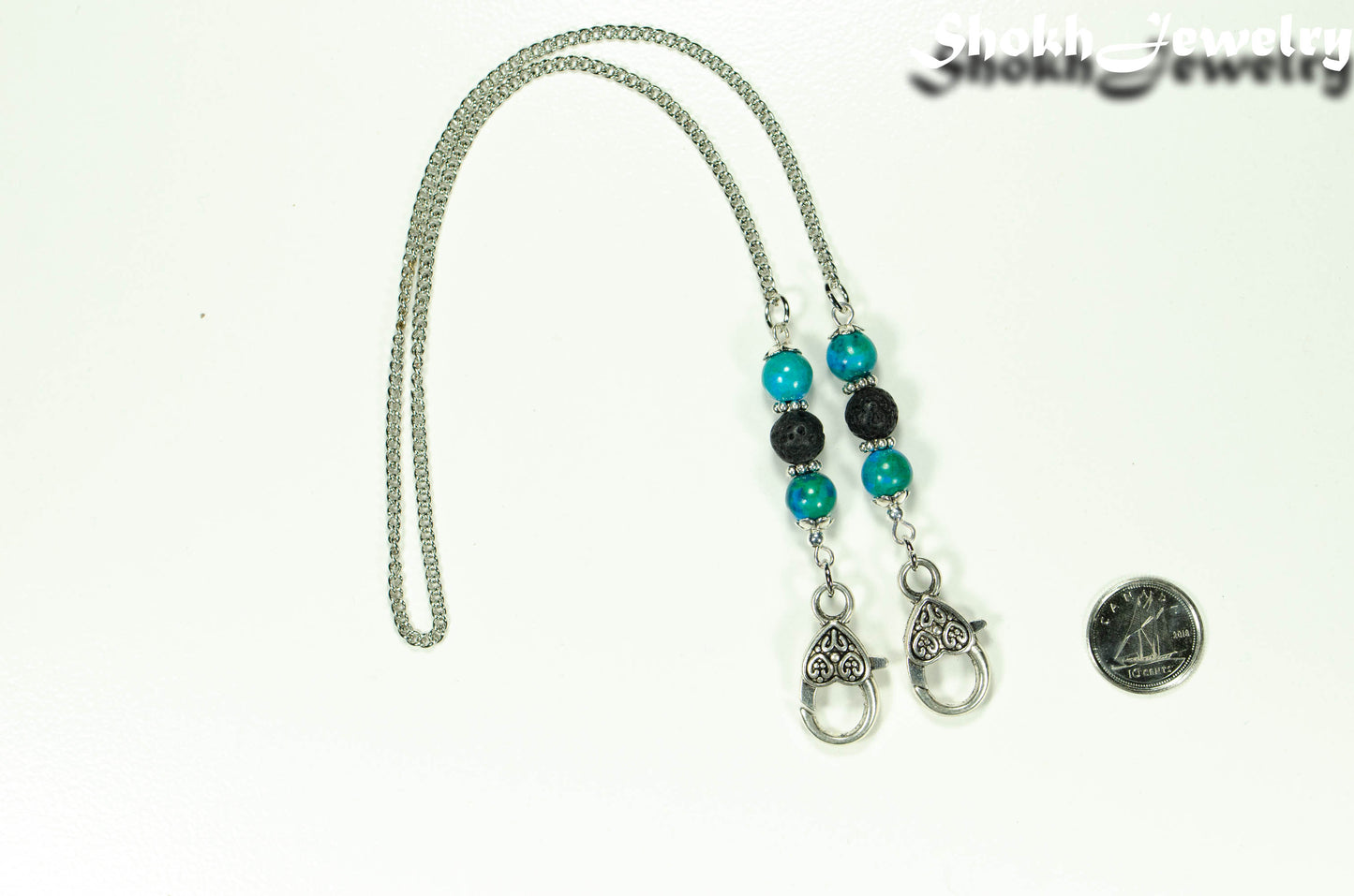 8mm Blue Jasper and Black Lava Stone Eyeglass Chain beside a dime.