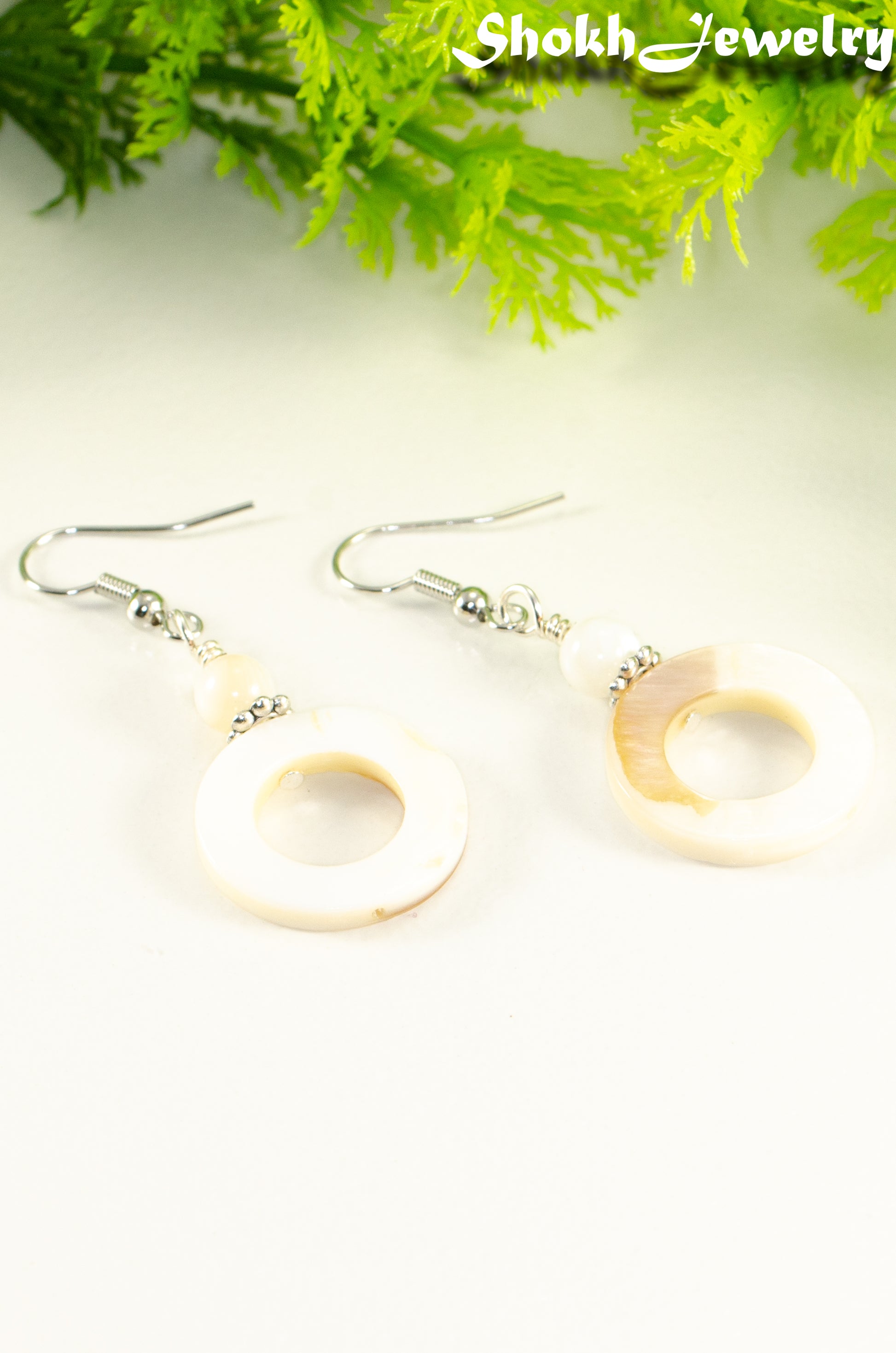 White Doughnut Seashell Earrings.