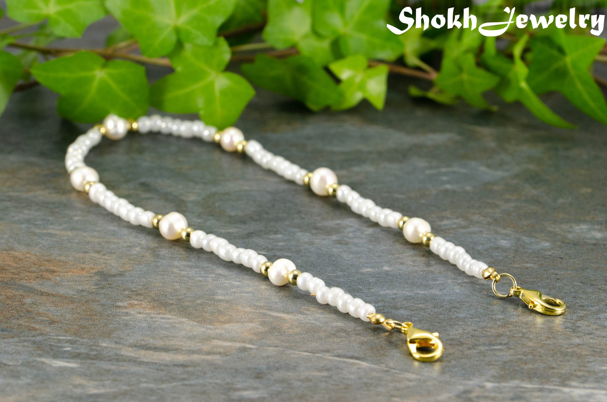 Freshwater Pearl and seed bead Eyeglass Chain with gold clasps.