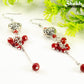 Close up of Statement Tibetan Silver Heart and Red Beaded Cluster Earrings.