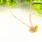 Close up of Rose Gold Plated November Birth Flower Necklace with Citrine Birthstone Pendant.