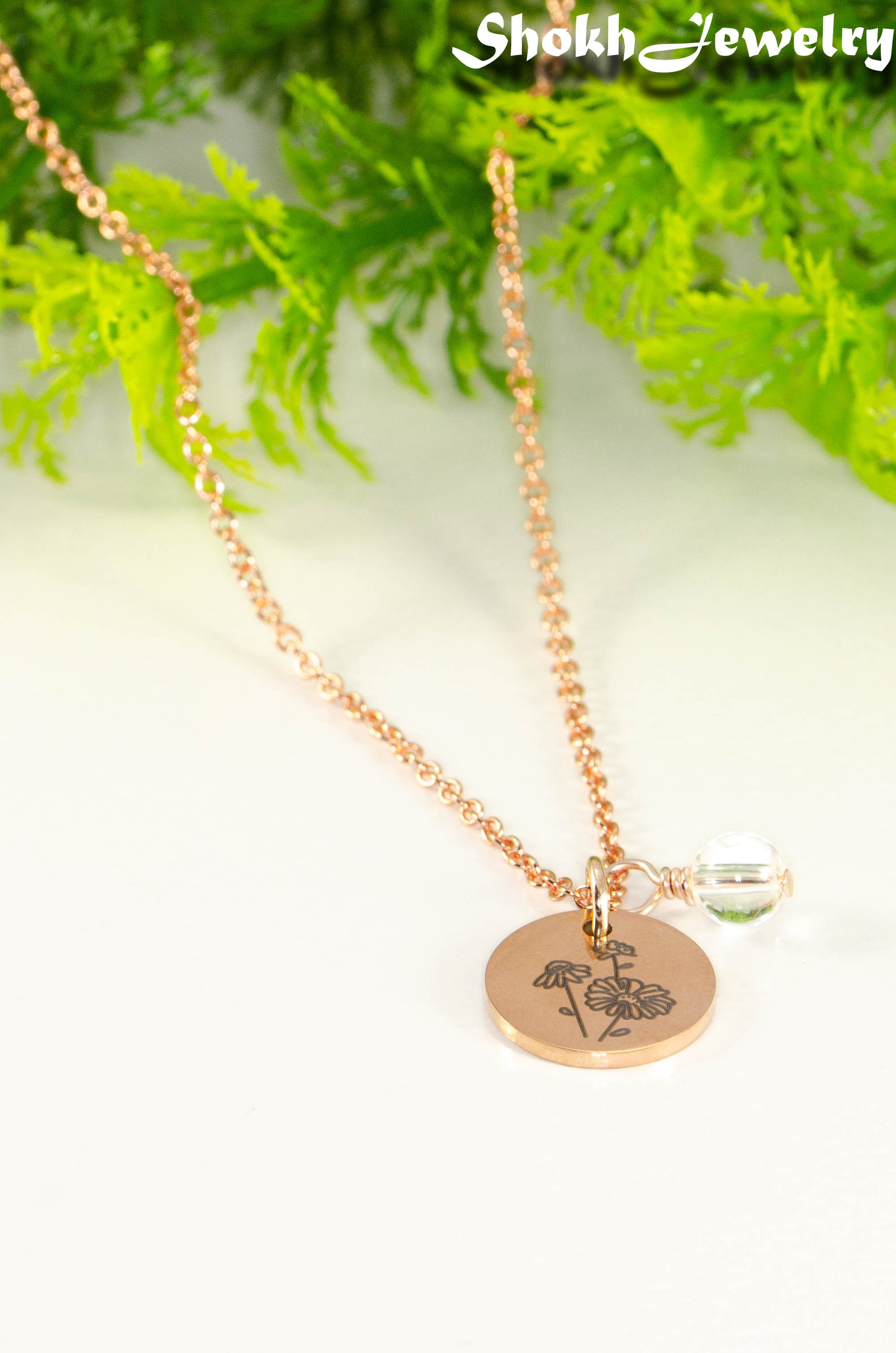 Rose Gold Plated April Birth Flower Necklace with Clear Quartz Birthstone Pendant.