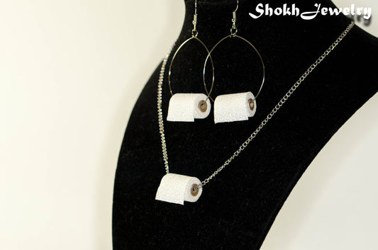 Miniature Toilet Paper Roll Necklace and Earrings Set displayed on a bust.