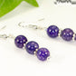 Close up of Natural Purple Dragon Vein Agate Beaded Bar Earrings.