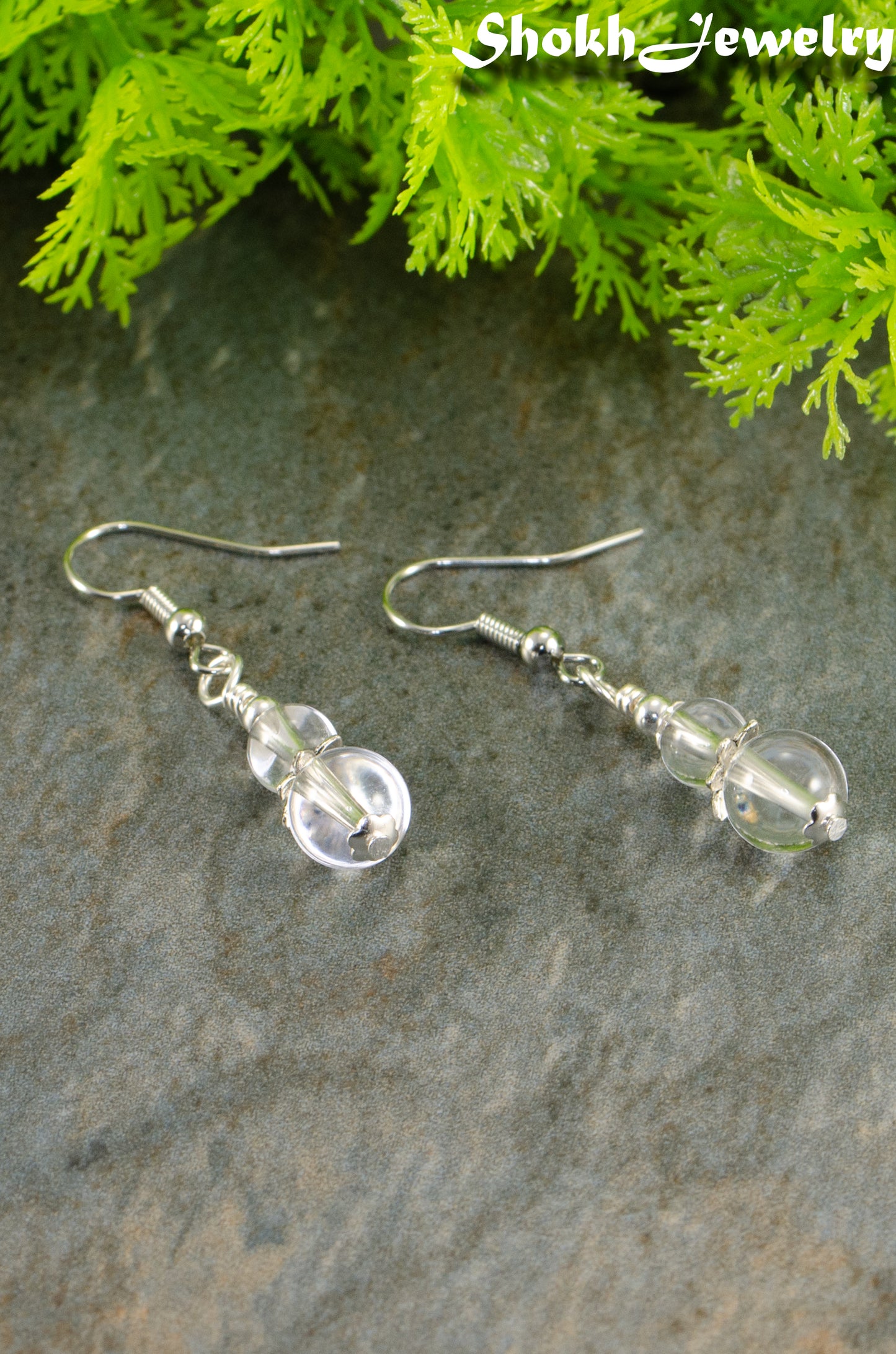 Close up of Small Clear Quartz Earrings.