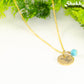 Gold Plated December Birth Flower Necklace with Turquoise Howlite Birthstone Pendant.