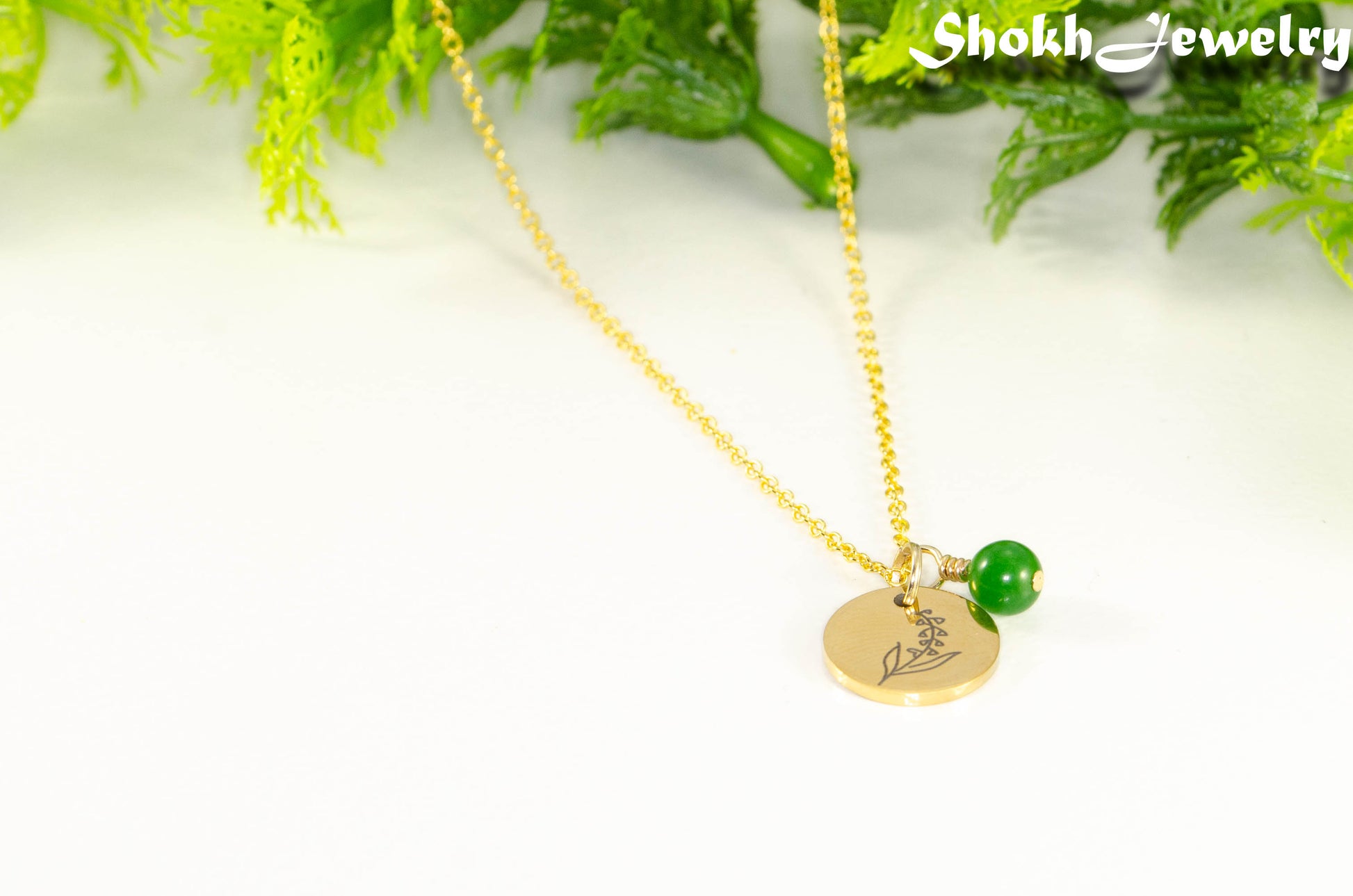 Gold Plated May Birth Flower Necklace with Emerald Birthstone Pendant.