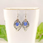 Filigree Silver Leaf Charm and Blue Glass Crystal Earrings.