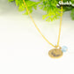 Gold Plated March Birth Flower Necklace with Aquamarine Birthstone Pendant.