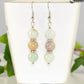 Natural Amazonite Beaded Bar Earrings displayed on a tea cup.