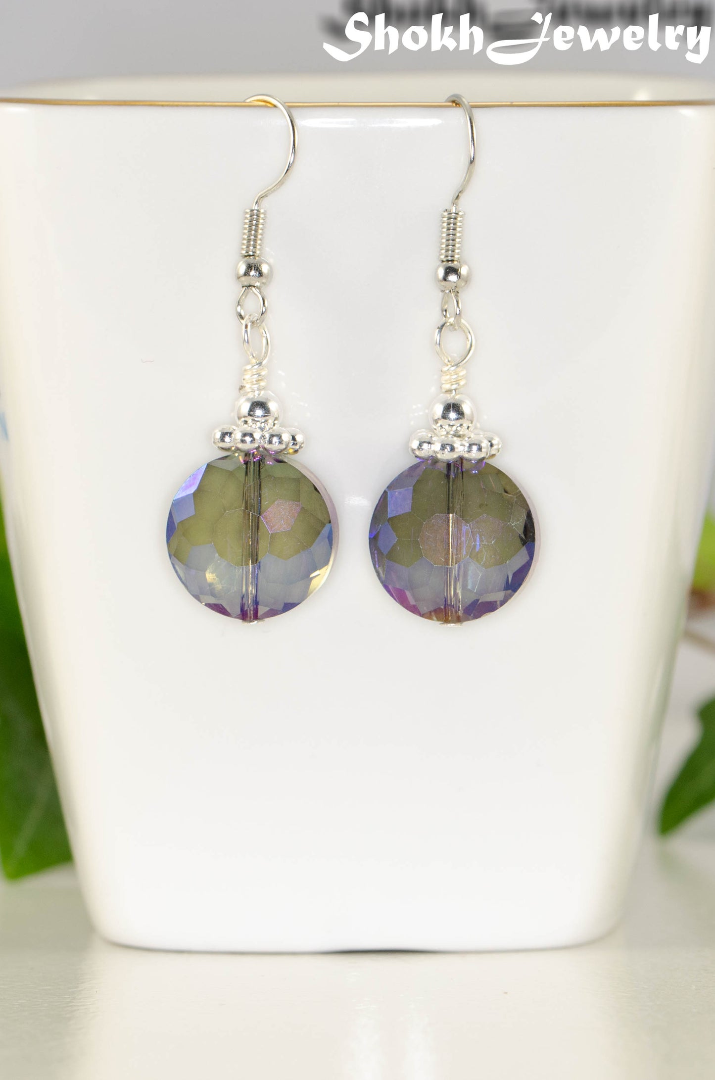 Close up of Iridescent Blue Glass Crystal Beads Earrings.