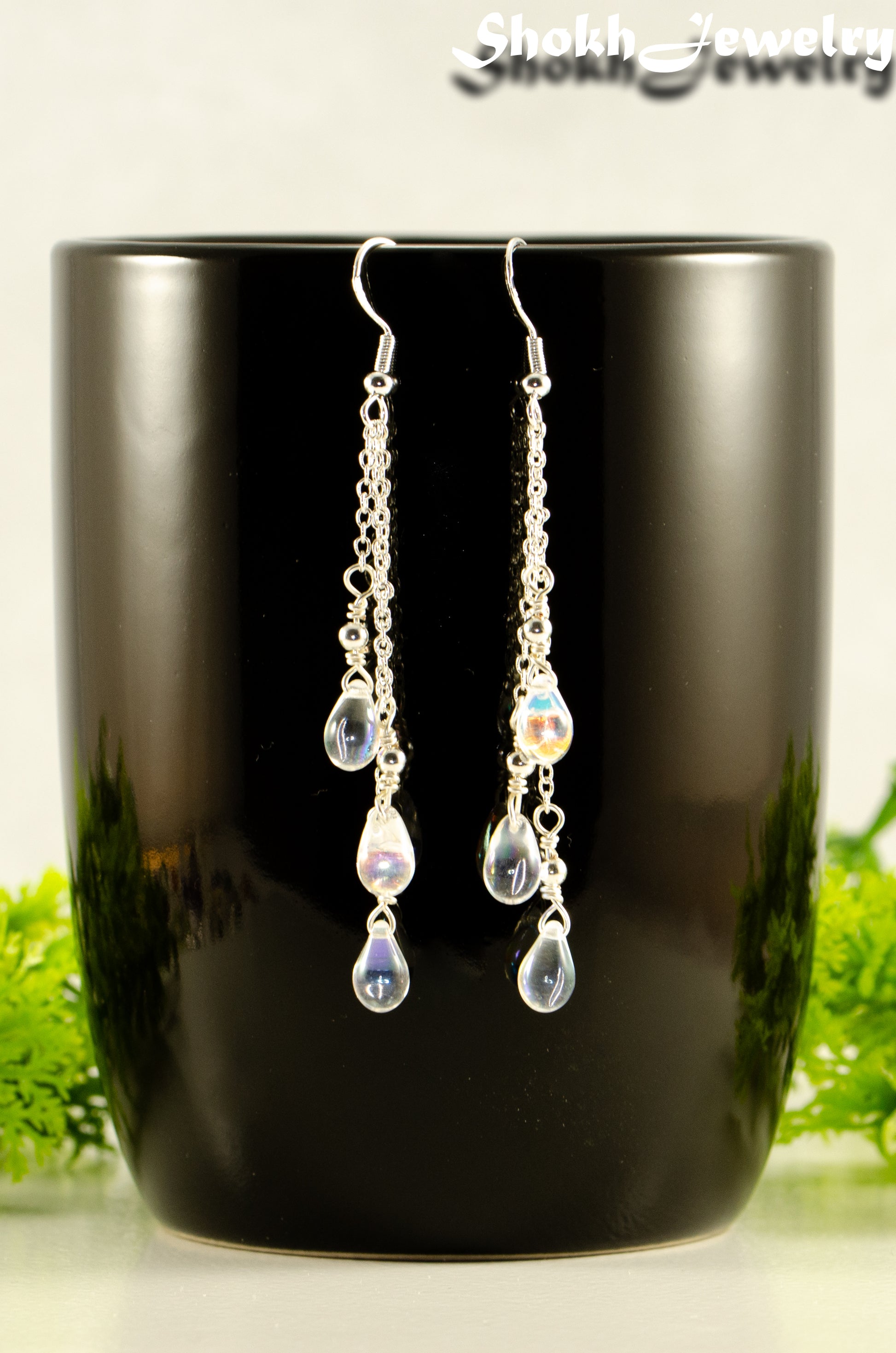 Close up of Long Silver Plated Chain and Czech Teardrop Crystal Earrings.