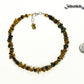 Natural Tiger's Eye Chip Anklet beside a dime.