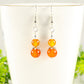 Close up of Small Natural Carnelian Earrings.