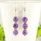 Close up of Natural Amethyst Beaded Bar Earrings.