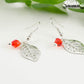 Filigree Silver Leaf Charm and Red Glass Crystal Earrings for women.