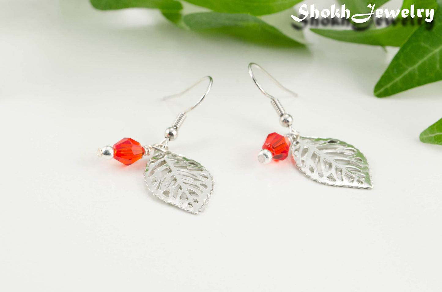 Filigree Silver Leaf Charm and Red Glass Crystal Earrings for women.