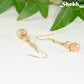 Close up of Small Light Pink Glass Bead Dangle Earrings.