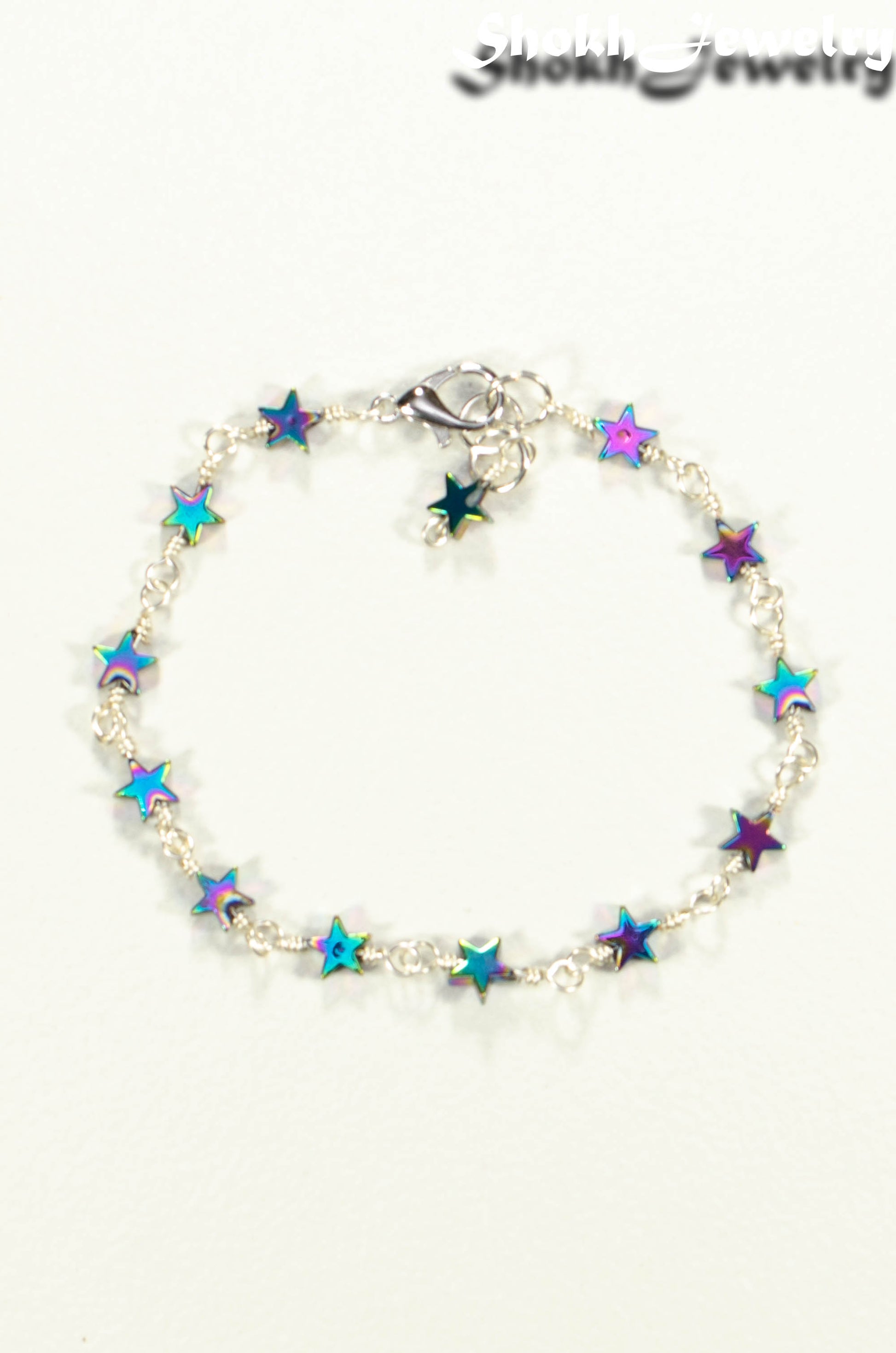 Top view of Small Rainbow Hematite Star Link Bracelet.