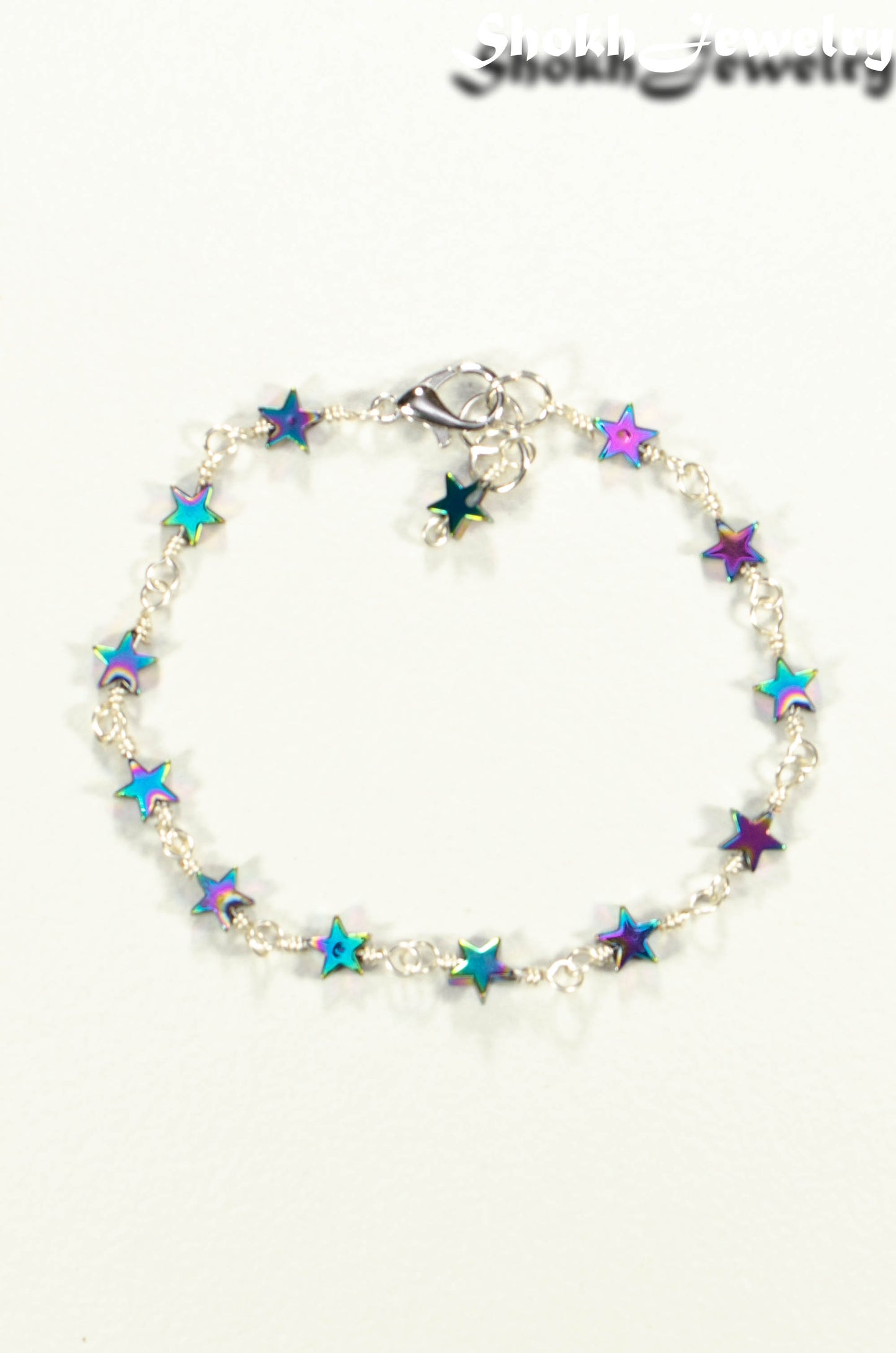 Top view of Small Rainbow Hematite Star Link Anklet.