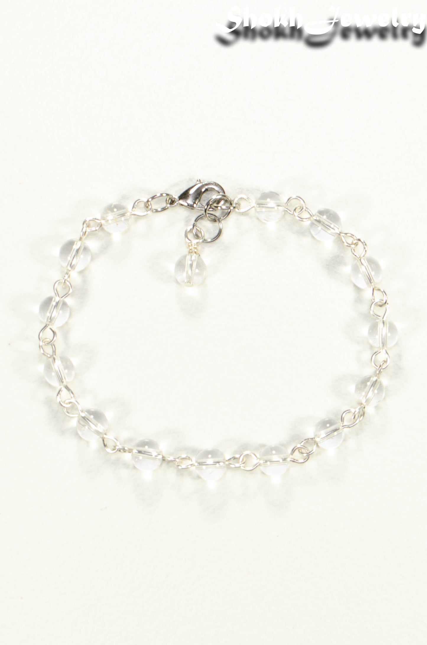 Close up of Handmade Clear Quartz Link Chain Anklet for Women.