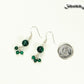 Genuine Malachite Dangle Earrings beside a dime.