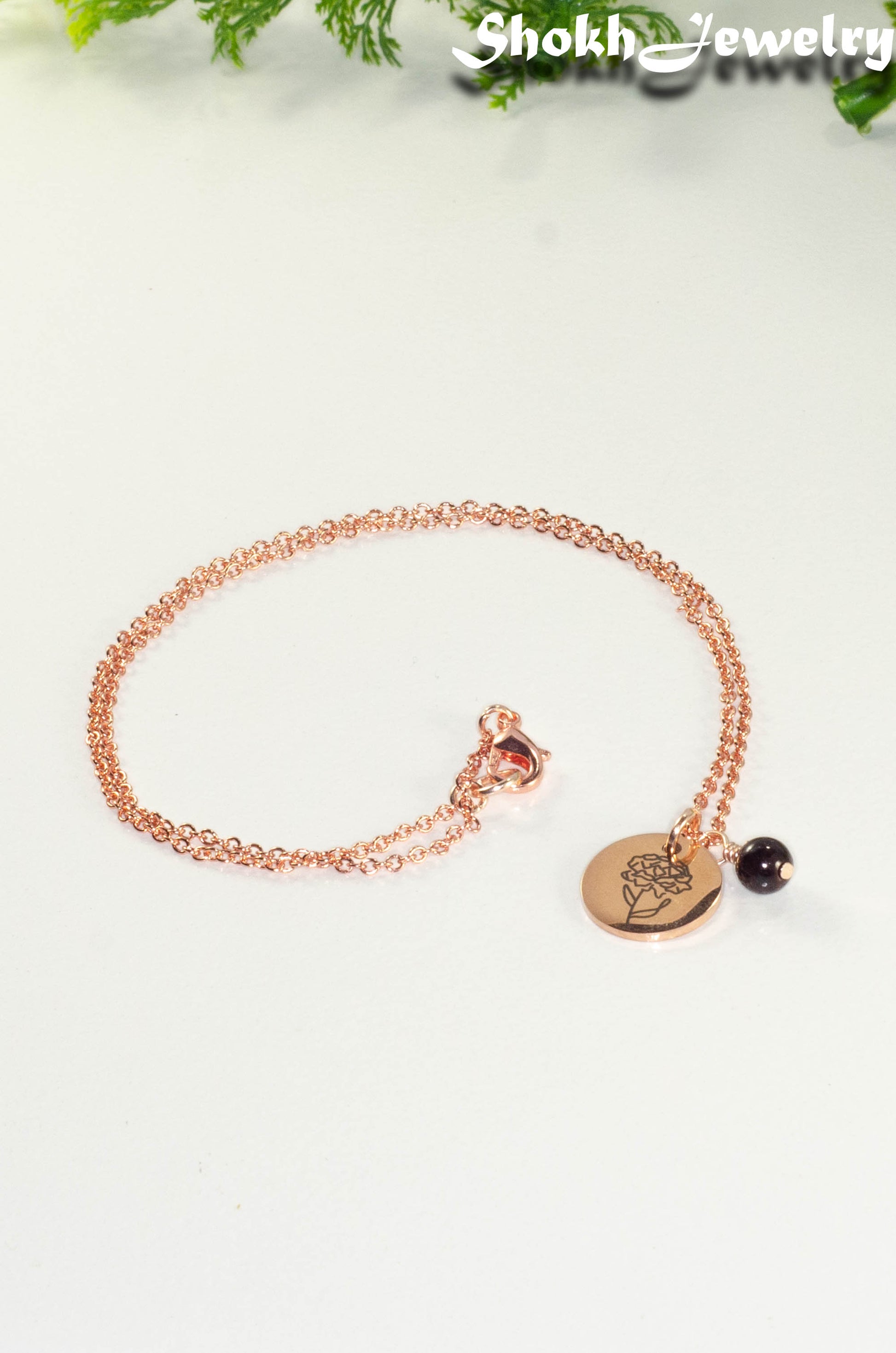 Rose Gold Plated January Birth Flower Necklace with Garnet Birthstone Pendant.