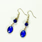 Top view of Navy Blue Oval Glass Dangle Earrings.