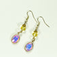 Top view of Light Yellow Oval Glass Dangle Earrings.