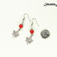 Red Howlite and Tibetan Silver Maple Leaf Dangle Earrings beside a dime.