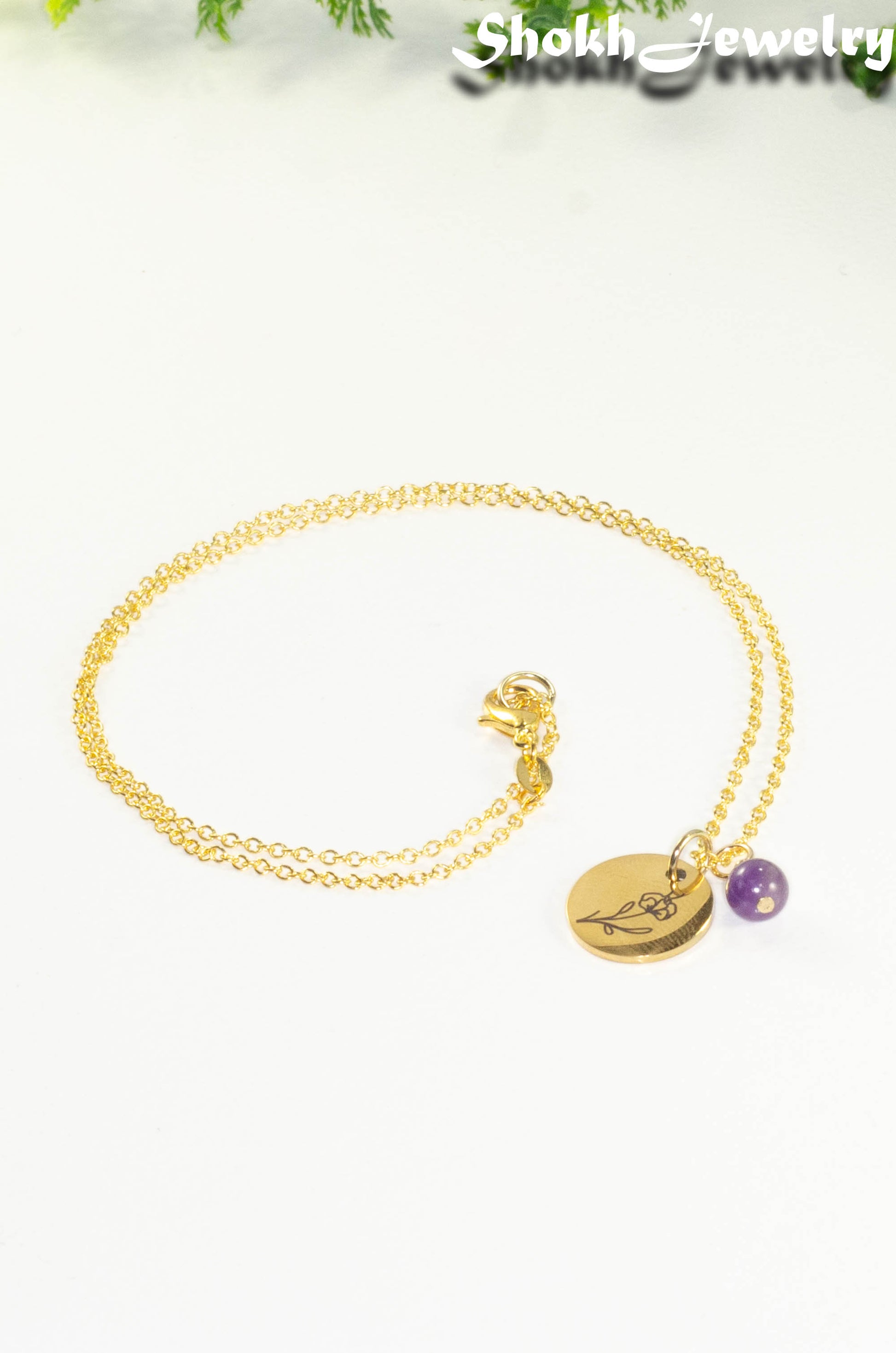 Gold Plated February Birth Flower Necklace with Amethyst Birthstone Pendant.