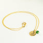 Gold Plated May Birth Flower Necklace with Emerald Birthstone Pendant.