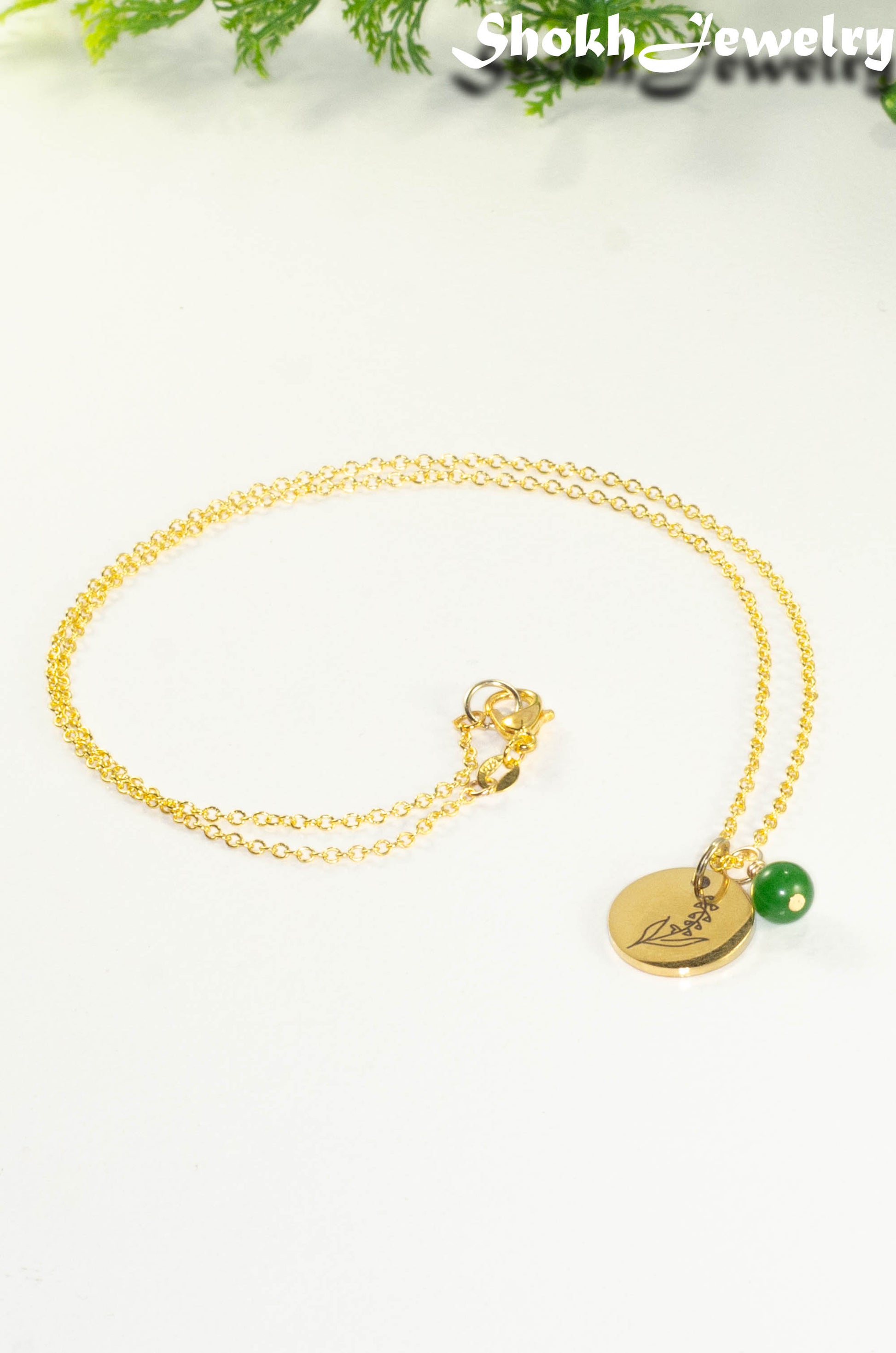 Gold Plated May Birth Flower Necklace with Emerald Birthstone Pendant.