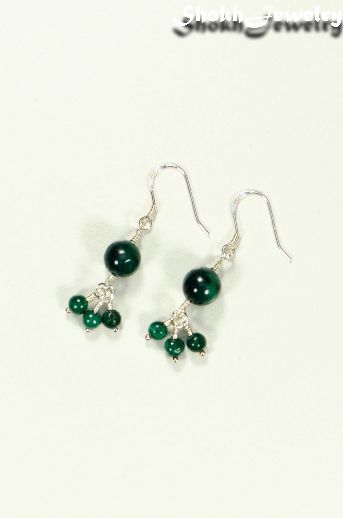 Top view of Genuine Malachite Dangle Earrings.