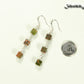 Long Unakite Cube Dangle Earrings beside a dime.