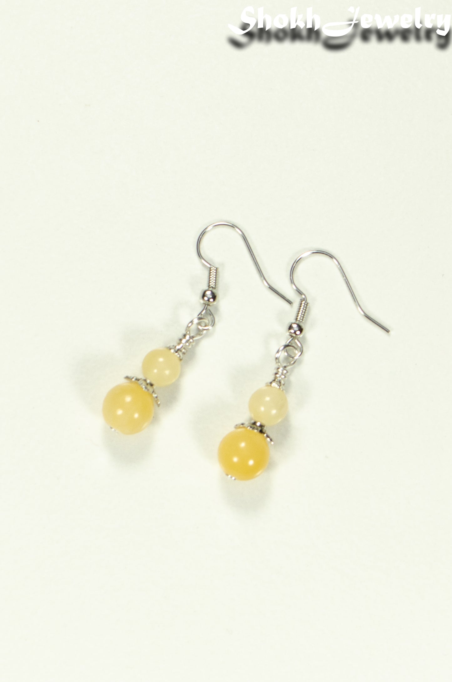 Top view of Small Natural Calcite Crystal Earrings.