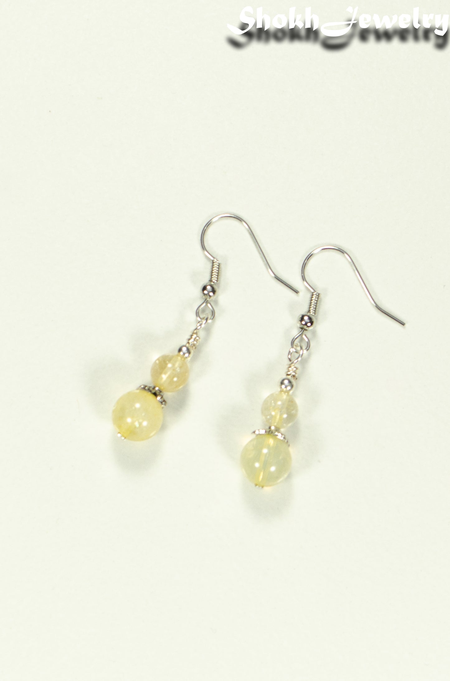 Top view of Small Natural Citrine Crystal Earrings.