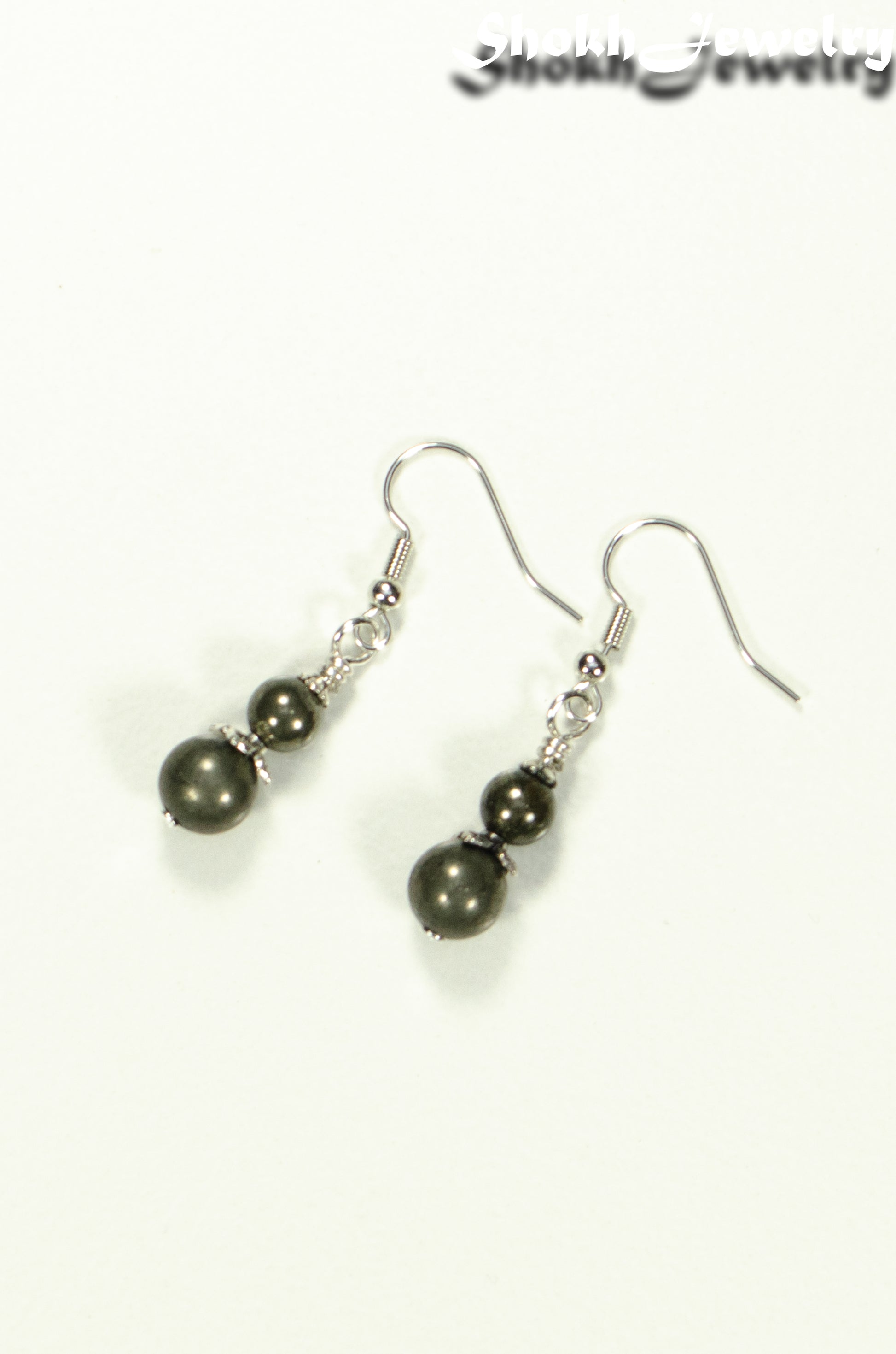 Top view of Small Natural Pyrite Earrings.