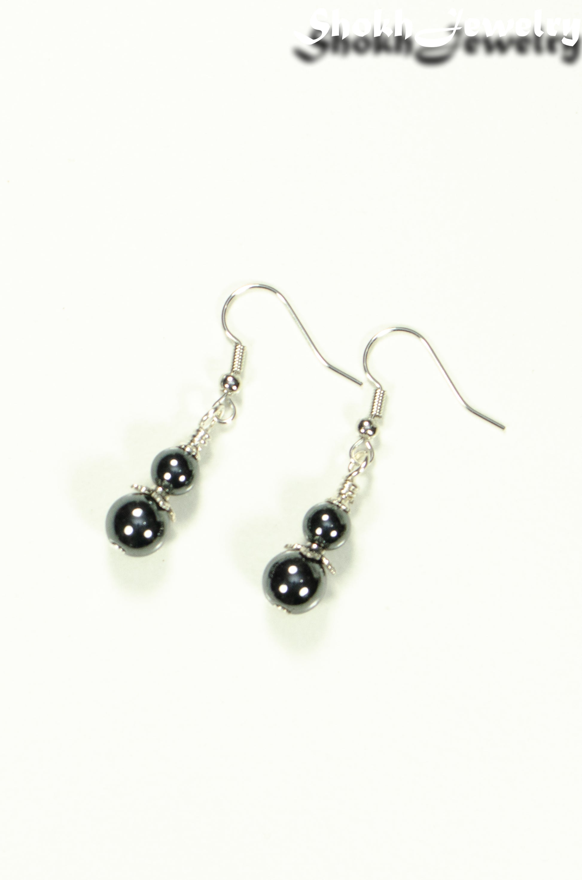 Top view of Small Natural Hematite Earrings.